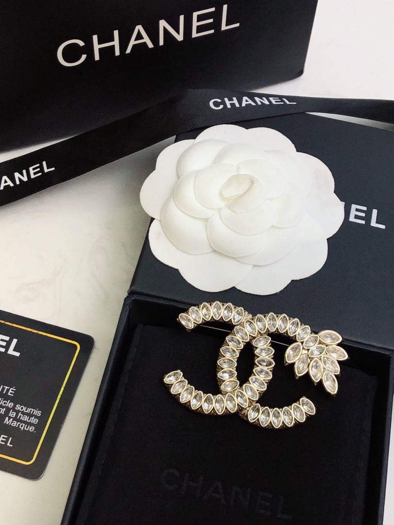 Ch**el brooches
